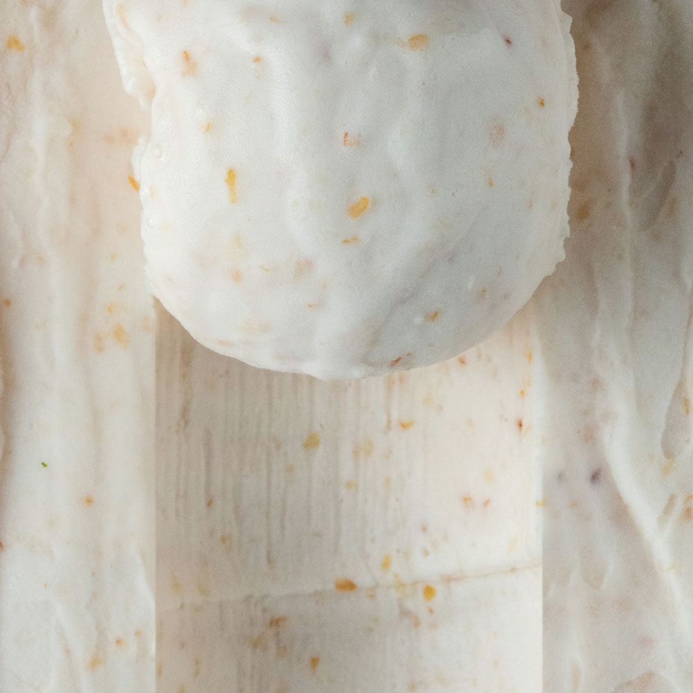 Close-up of half scooped lychee sorbet